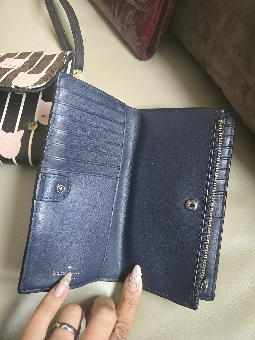 kate spade navy leather continental wallet with crown cutouts